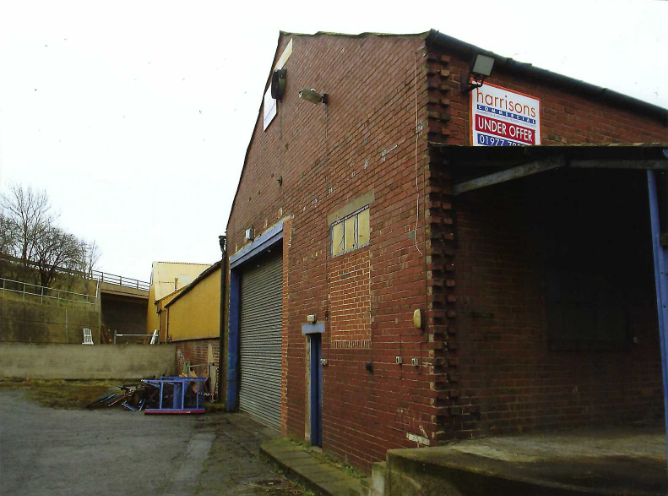 Outdoor picture of the C&C workshop