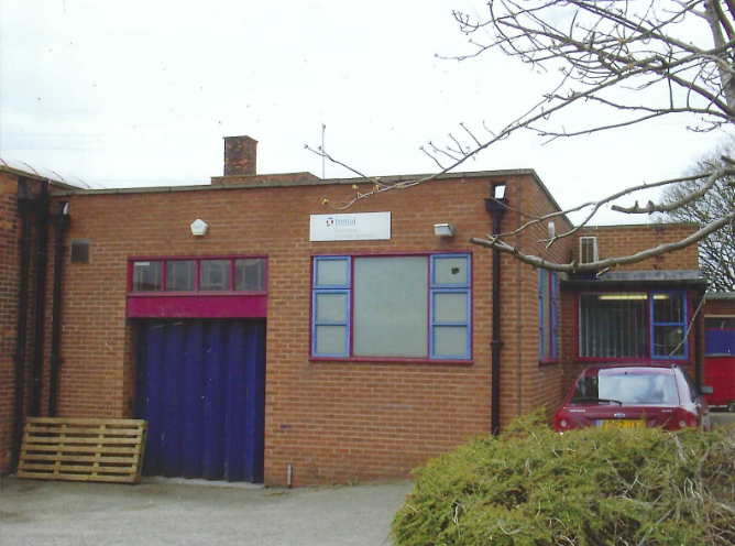 Outdoor picture of the C&C workshop from 1997